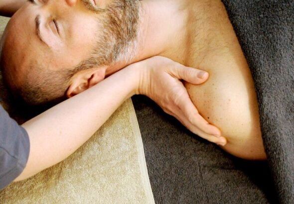 man lying on bed